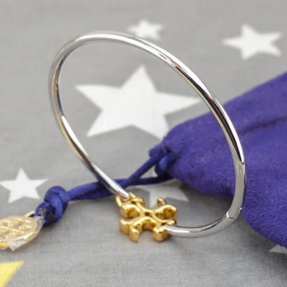 Tory Burch Eleanor Hinged Cuff Bracelet in Gold / Silver. - Picture 2 of 6